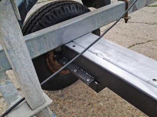 NEW AXLE AND SUSPENSION UNITS FITTED TO SNIPE BOAT TRAILER